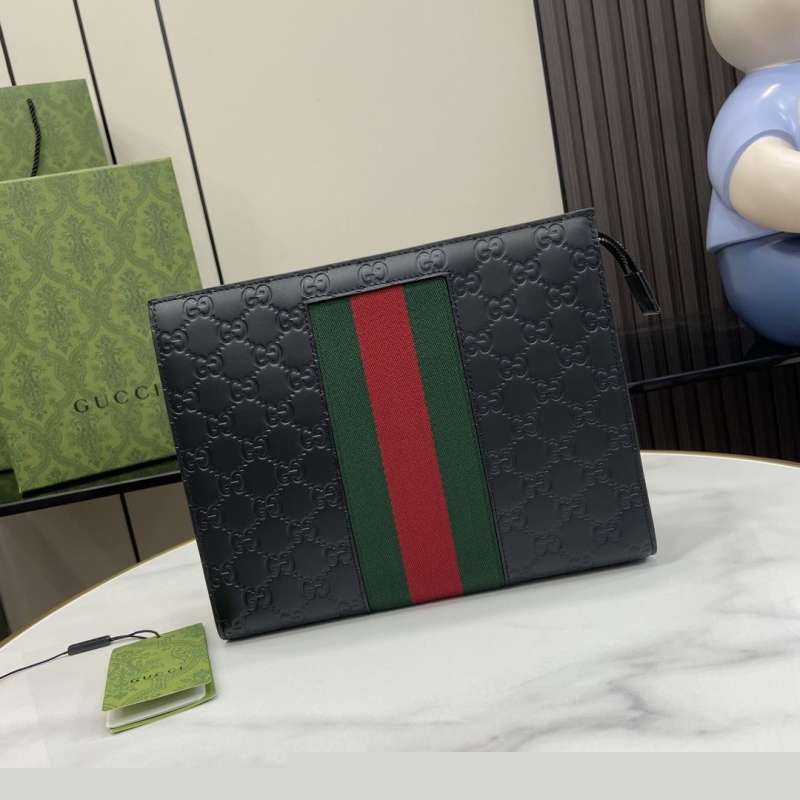 G*u*i clutch bags